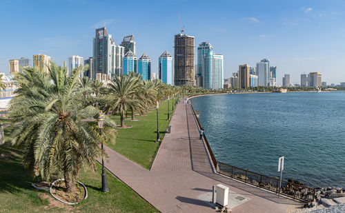 Buildings in city against sky