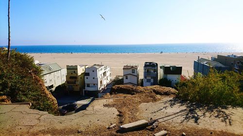 Scenic view of beach against clear sky