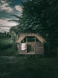 House on field against sky