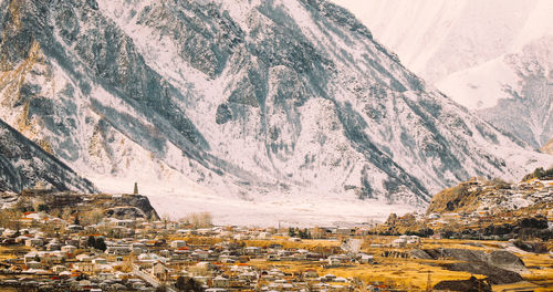 Scenic view of snowcapped mountains against sky