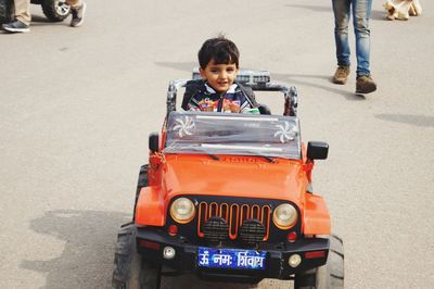 Portrait of boy on bus