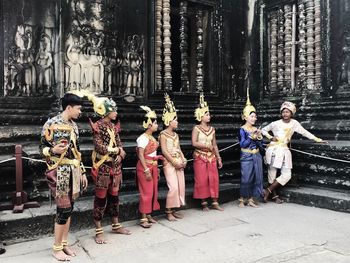 Group of people standing in front of building