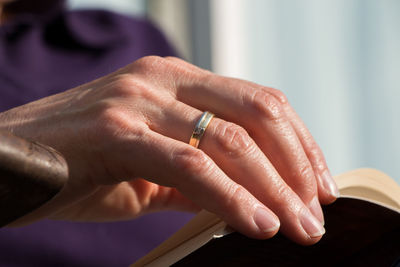 Close-up of hand holding hands