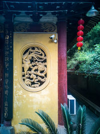 Entrance of temple against building