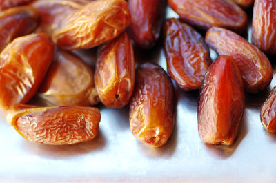 Close-up of dried dates on table