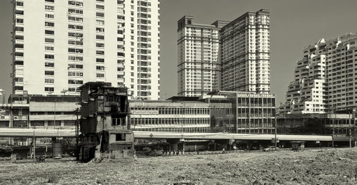 Train against buildings in city