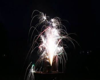 Firework display at night