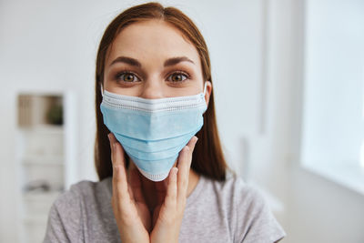 Portrait of smiling woman wearing mask