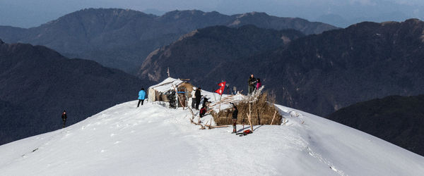 Group of people on mountain road