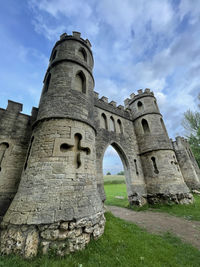 Old ruin building against cloudy sky