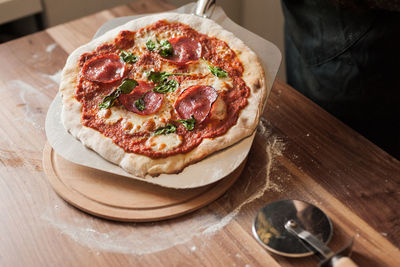 High angle view of pizza on table