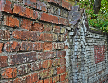 Stack of stones on brick wall