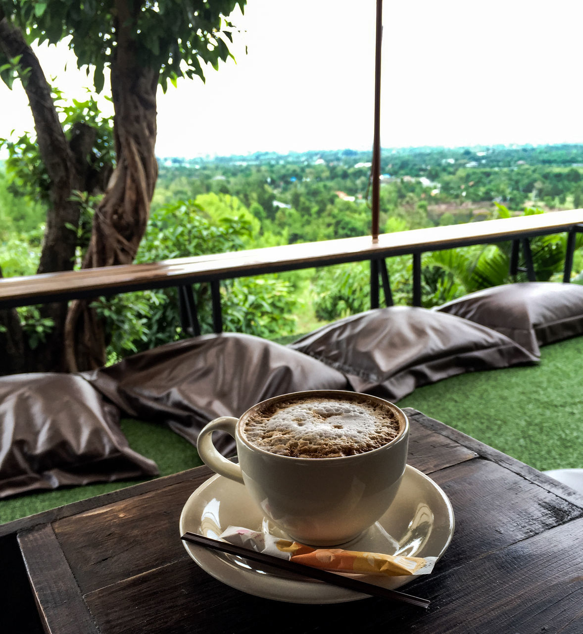 COFFEE AND CUP ON TABLE