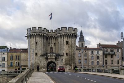 View of building against cloudy sky