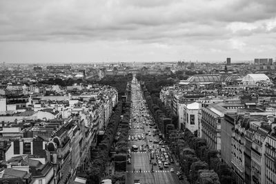 Aerial view of cityscape against sky