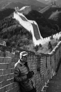 High angle view of woman standing against built structures