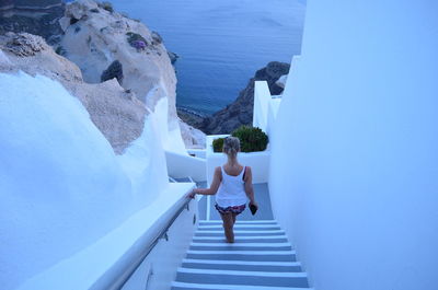 High angle view of woman on steps at santorini