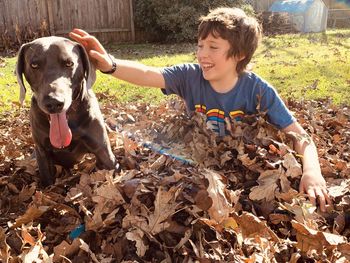 Portrait of boy with dog