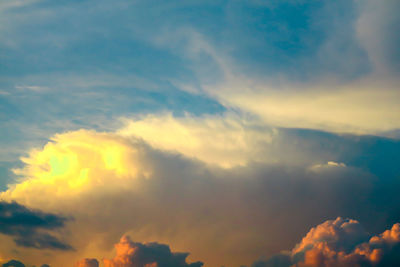 Low angle view of clouds in sky during sunset