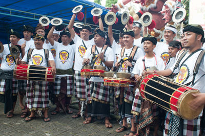 Group of folk musicians outdoors