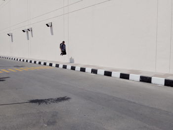 People walking on bridge in city