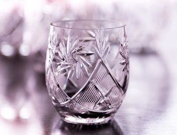 Close-up of drinking glass with floral pattern