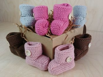 Close-up of colorful woolen socks on table