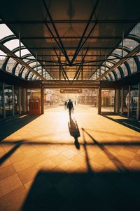 Man walking on railroad station platform