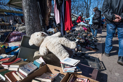 Portrait of teddy bear in market on sunny day