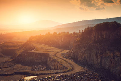 Scenic view of landscape against sky during sunset