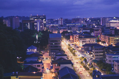 High angle view of illuminated cityscape at night