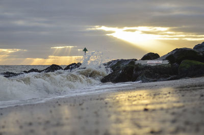 Scenic view of sea against sky during sunset