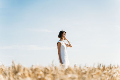 Portrait of a caucasian woman in the country during the summer