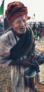Portrait of man sitting outdoors