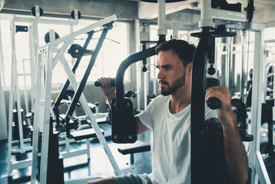 Man exercising in gym