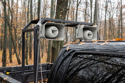 View of telephone booth in forest