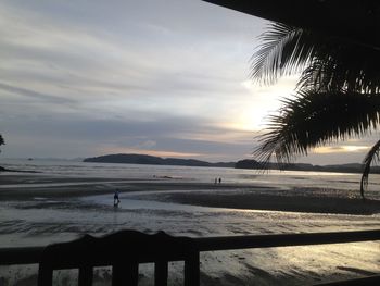 Scenic view of sea at sunset