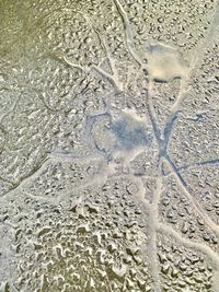 Full frame shot of wet sand