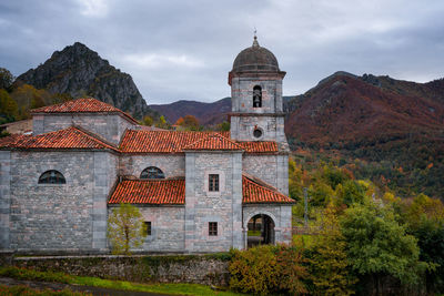 Asunción de nuestra senora church in picos de europa national park on an autumn landscape, spain