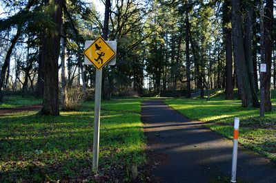 Information sign on grassy field