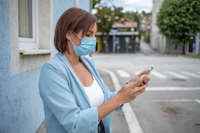 Young woman using mobile phone