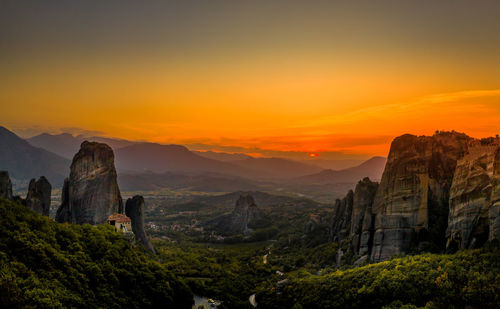 Scenic view of landscape against sky during sunset