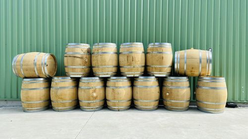 Stack of  wooden wine barrel  in row