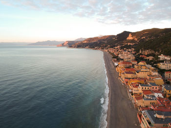 High angle view of sea against sky during sunset