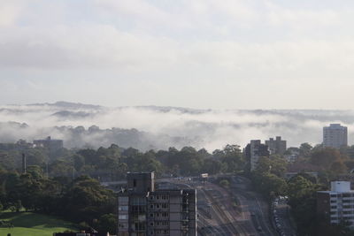 High angle view of buildings against sky