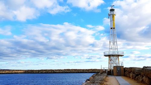 Low angle view of lighthouse against sky