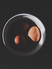 Close-up of object over black background