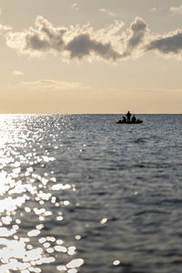 Scenic view of sea against sky during sunrise