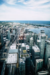 High angle view of buildings in city against sky