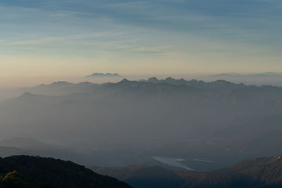 Scenic view of mountains against sky during sunset